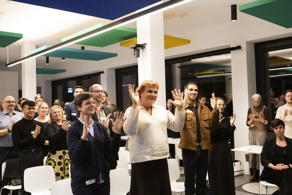 Publikum bei der Präsentation
